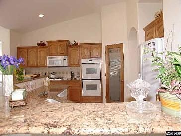 Kitchen with granite slab