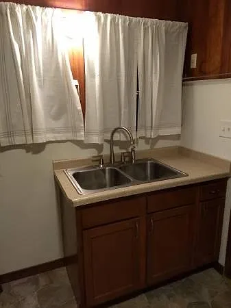 Kitchen sink under windows