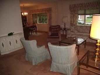 Living room w/ dining room in Background