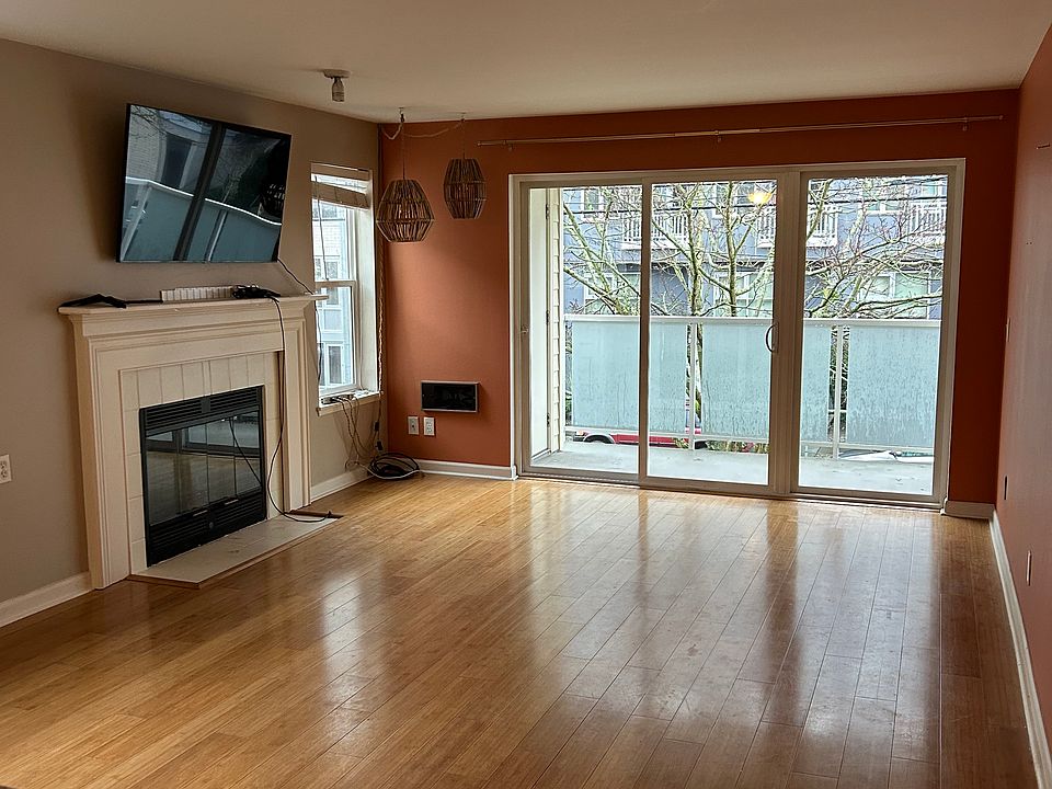 Living room, fire place, and balcony