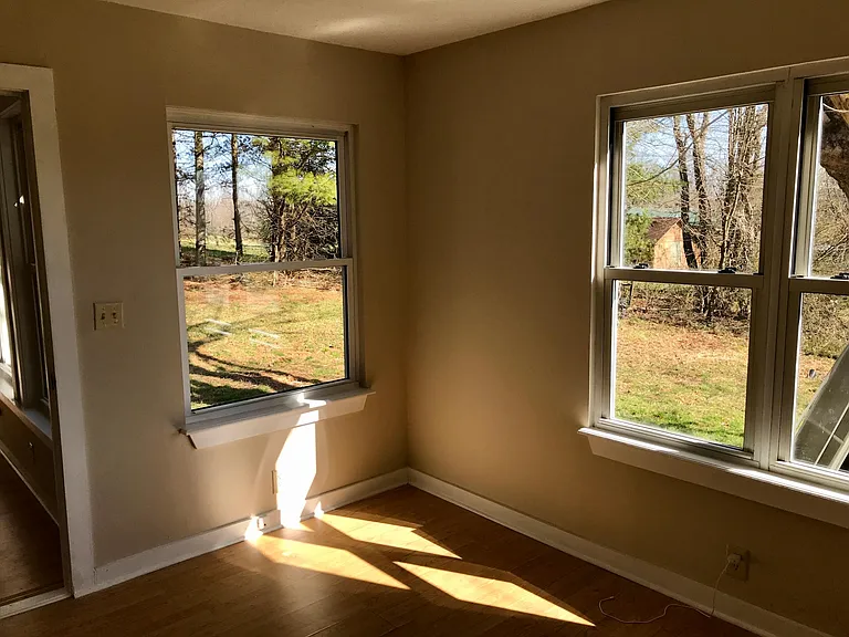 This room has a closet and could be a bedroom or a study.