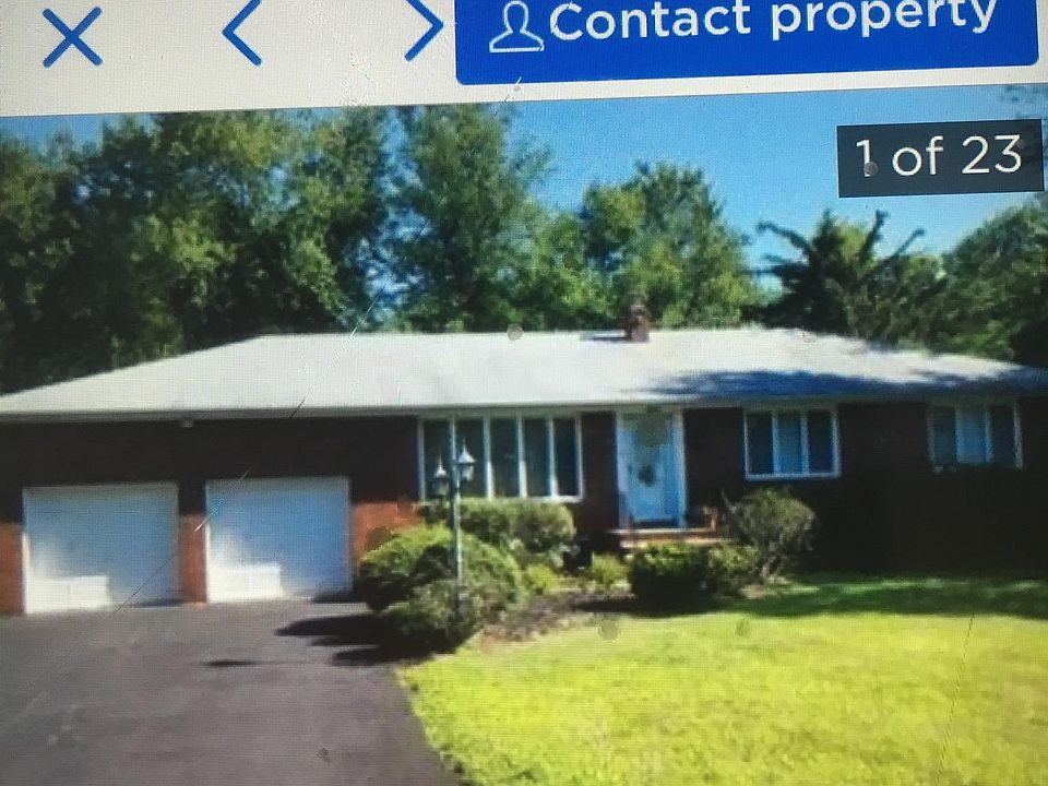 Front of House............2 Car Garage... large driveway 4 Cars.....