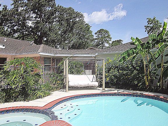 Other: Beautiful backyard is truly a tropical paradise with nice pool & spa