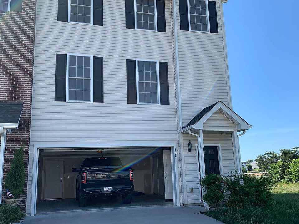 end unit with garage and separate storage area with walk out