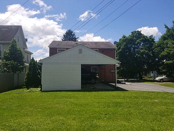 Back yard with covered parking