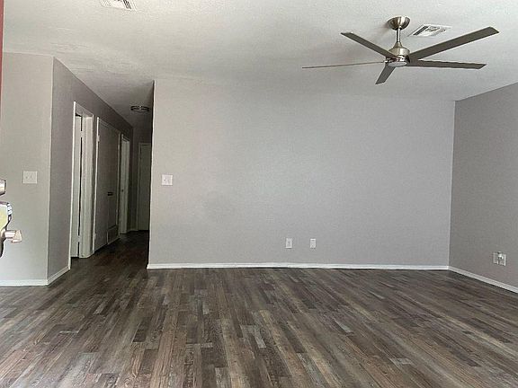 Relaxed hallway and living room entry.