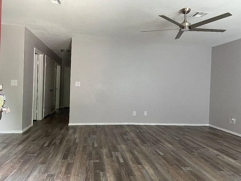 Relaxed hallway and living room entry.