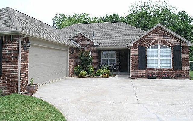 One-level, full brick home withtwo-car garage.
