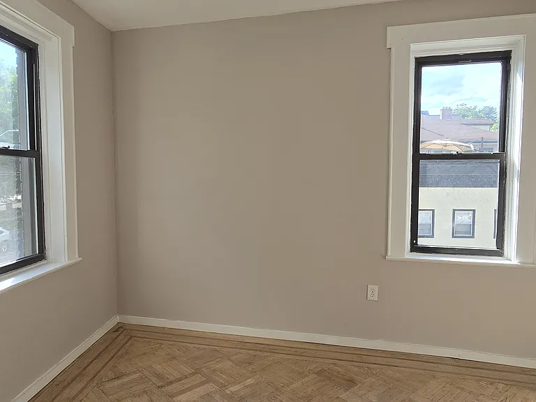 This special unique apartment home has windows on 2 sides with views of a lovely park across the street