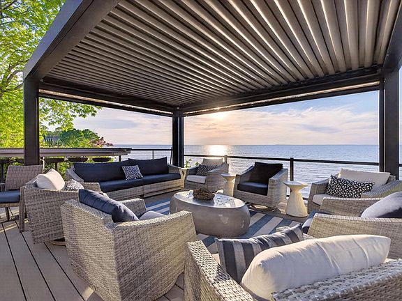 Seating for 10 comfortably under the Pergola. Swivel rockers for 8 lucky guests. The roof opens up by remote to let the sunshine in. Adjustable sunscreens to the north and west if the sun gets too bright.