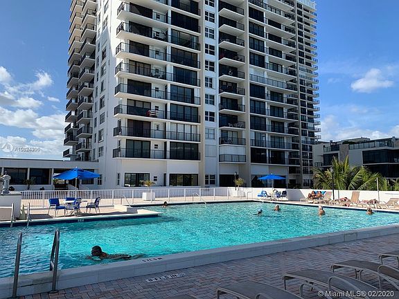 Beautiful pool with cabanas.