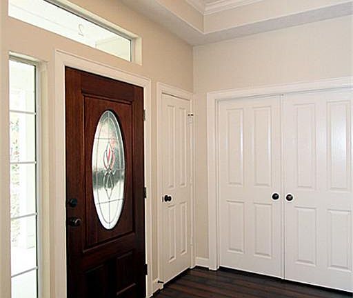 Enter into the foyer and take notice of the beautiful laminate wood flooring that flows throughout t