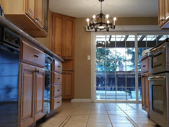 Tile kitchen floor and eating area