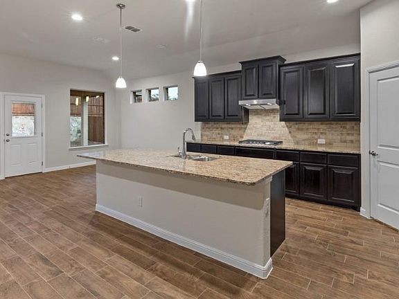 Kitchen - All Home and community information, including pricing, included features, terms, availability and amenities, are subject to change at any time without notice or obligation. All Drawings, pictures, photographs, video, square footages, floor plans, elevations, features, colors and sizes are approximate for illustration purposes only and will vary from the homes as built.
