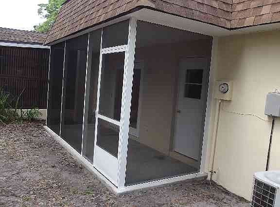 View of rear enclosed patio