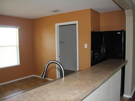 Kitchen with laundry room