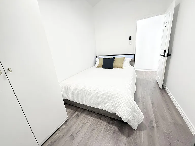 The bed has a charging station on the bed frame, two shelves and LED lights. Under storage drawers from side and front.