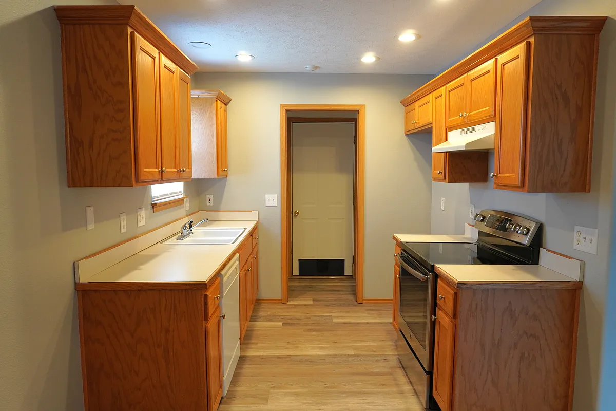 Kitchen, Laundry, and Exit to Garage - 514 W Black Oak Rd