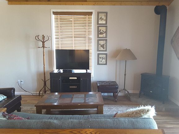 Completely furnished including TV with wireless internet provided and an electric woodburning stove.
