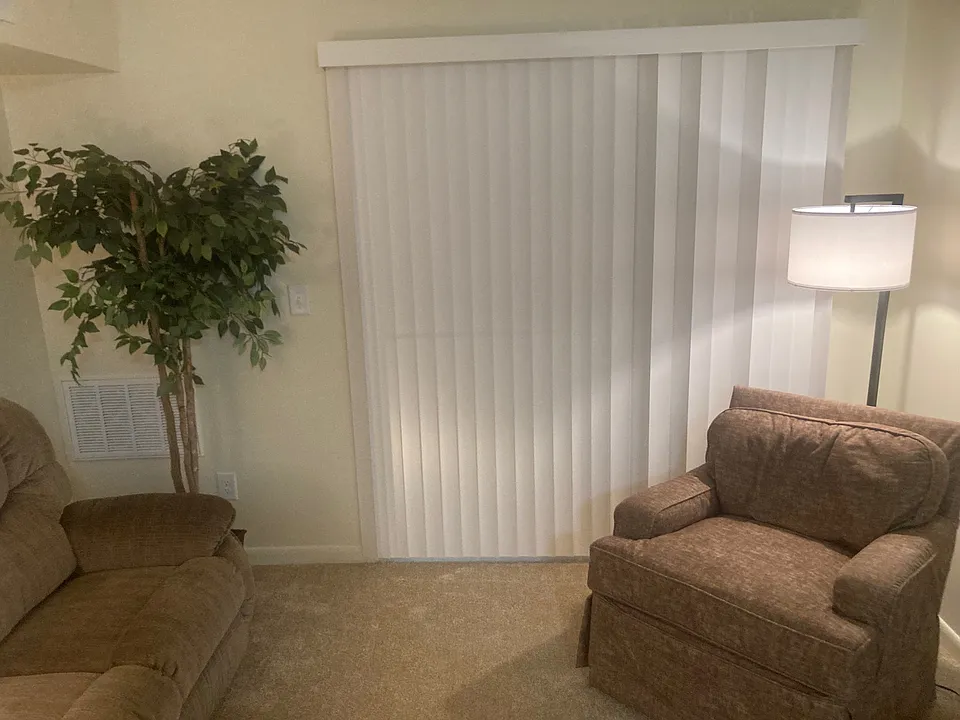 Living room, showing door to patio.