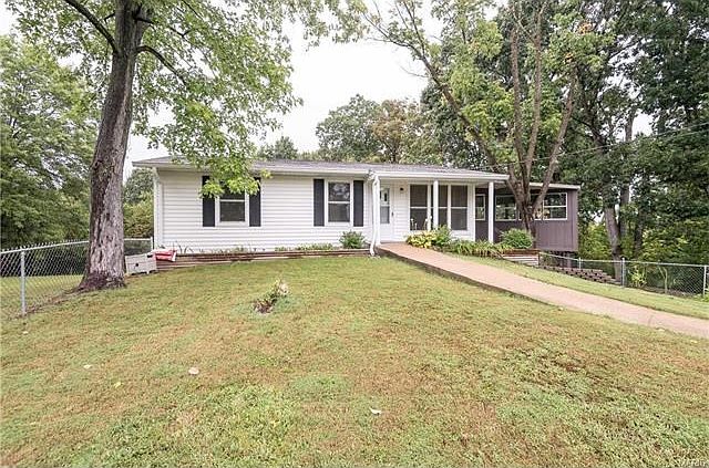 Nearly an acre lot located at the end of a quiet street.  Private and serene.