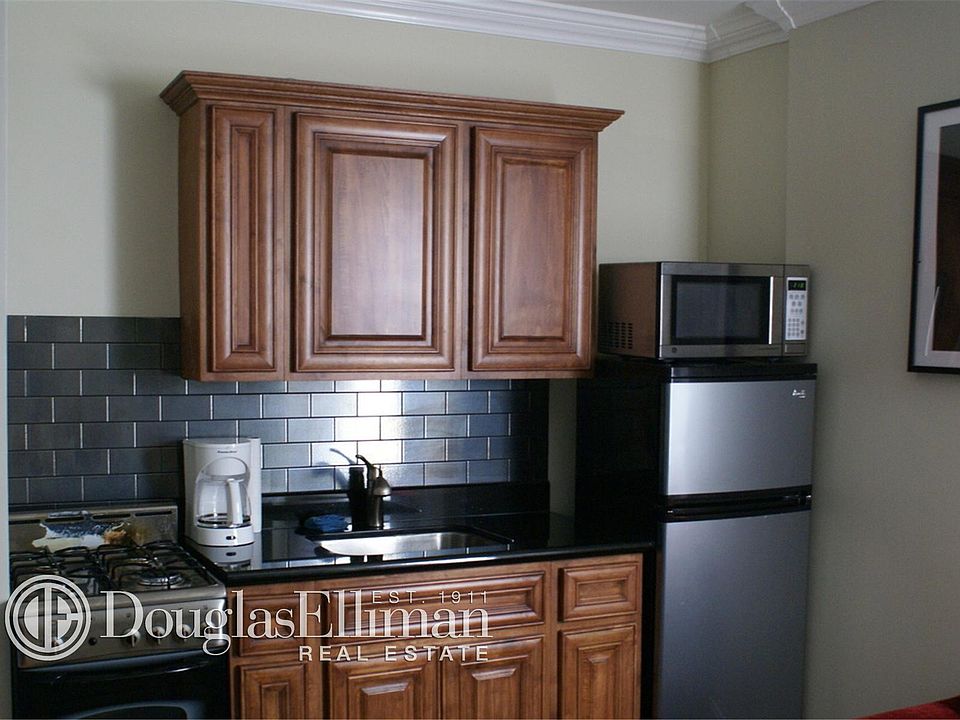 1st image of 213 W 28th St APT 1