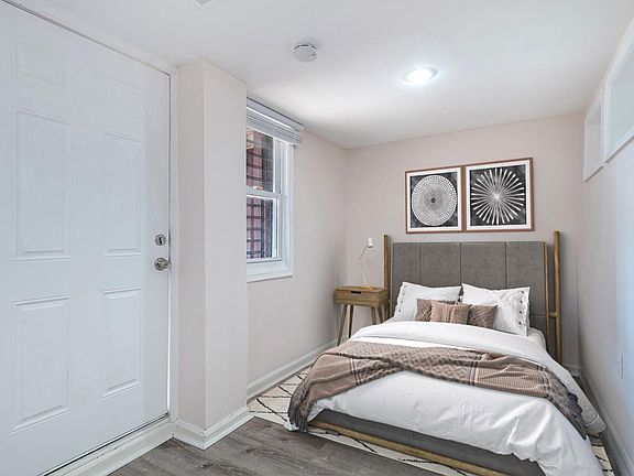 Bedroom 1. This image shows a virtually furnished space. Bedrooms come unfurnished.