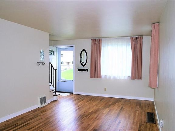 The handsome, updated, front door extends a warm welcome to all! Enjoy the ability to create and personalize!