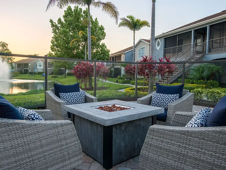 Witness the breathtaking sunset over the lake at our fire pit, a mesmerizing end to a day.