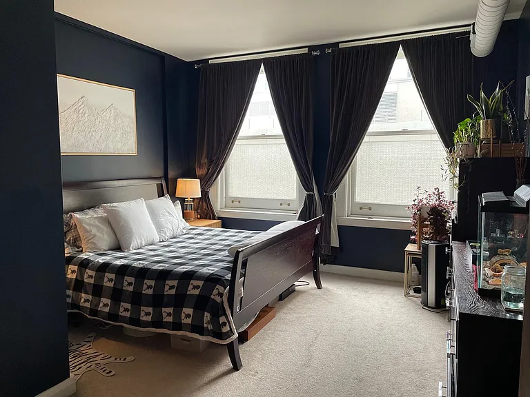 Large bedroom with custom walk in closet and full bath attached.