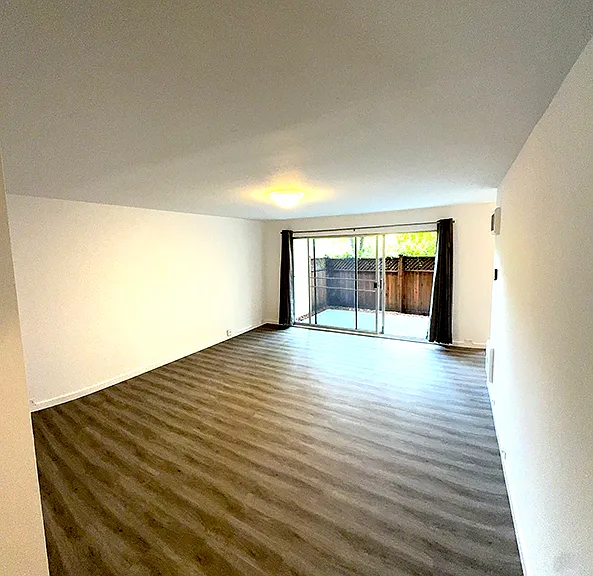 Living Room with sliding glass doors out to patio