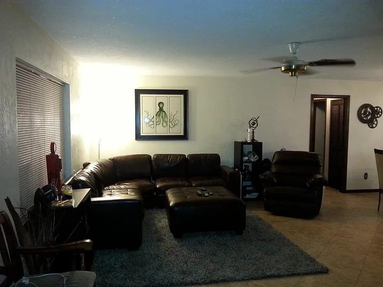 All tile 18x18 "travertine" tile living room