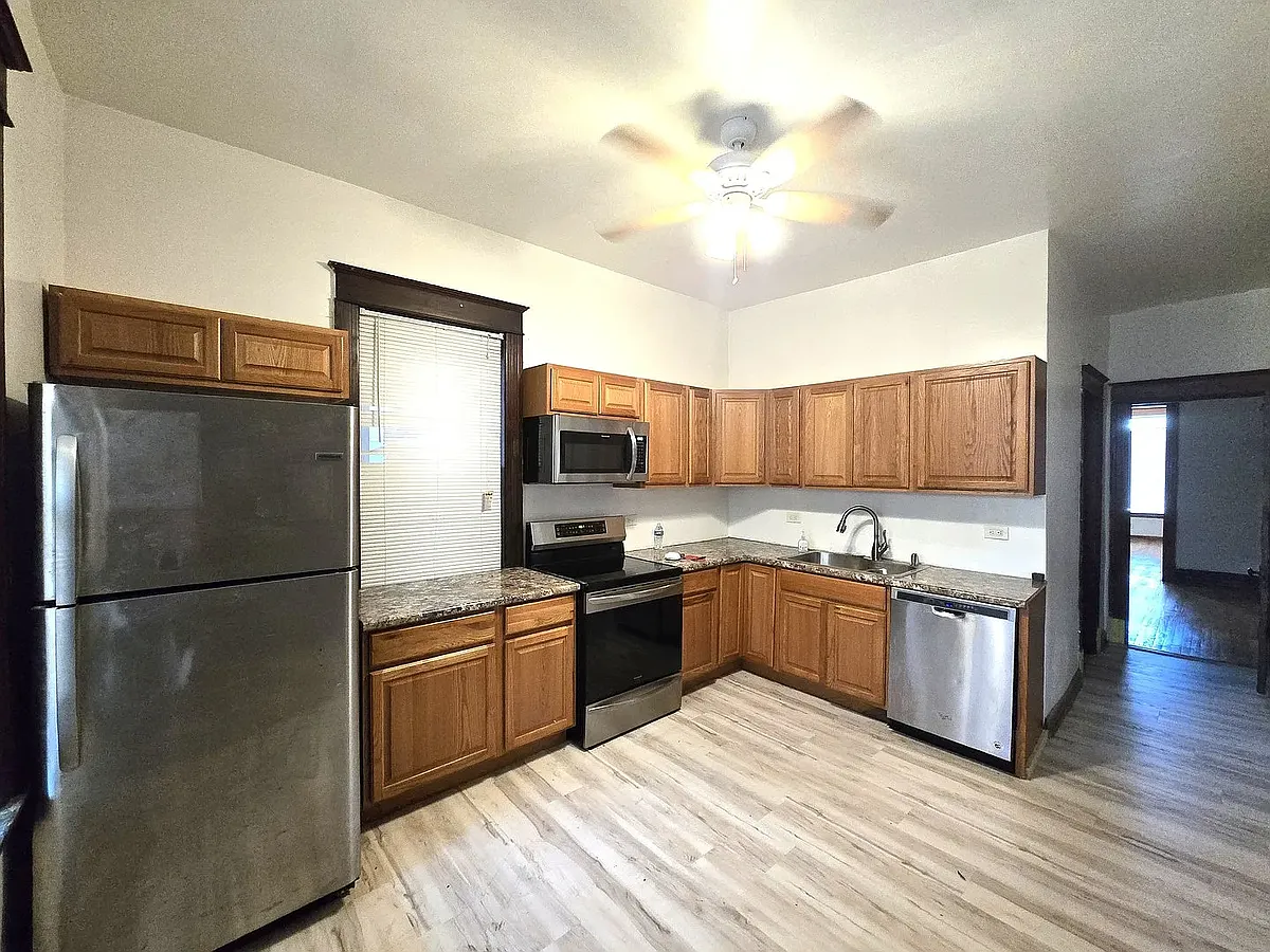 Building Photo - 6339 S Eberhart Ave #1