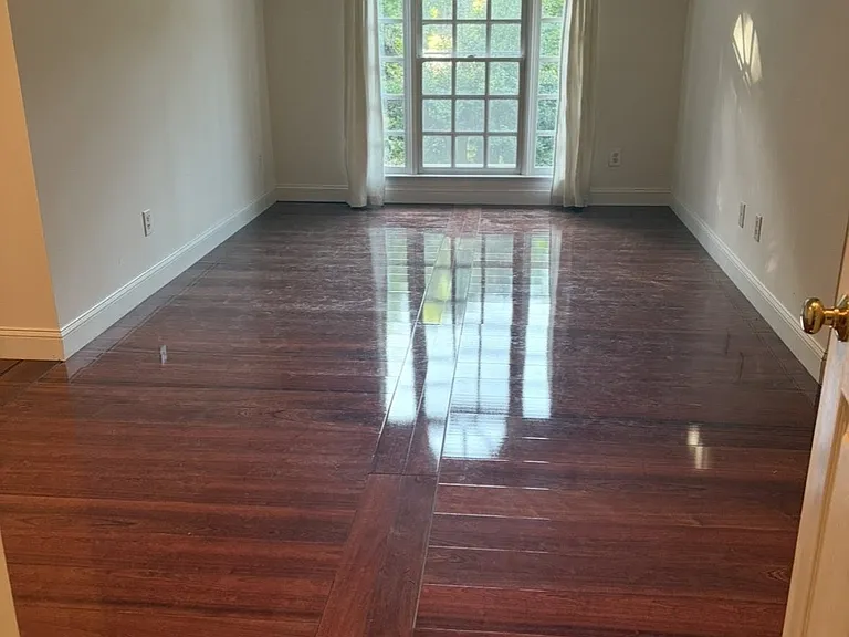 2nd Bedroom/Rec Room. The other upstairs bedroom is more rectangular with a flat ceiling, and has identical flooring.