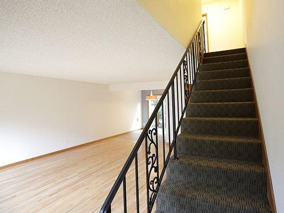 Carpeted stairs take you to a full bath and 2 very large bed