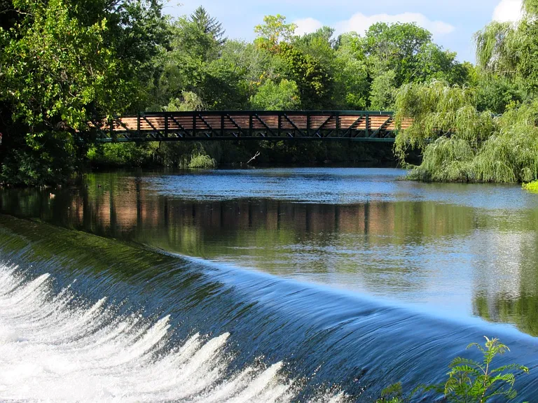 Watertown Dam & pedestrian bridge by the house