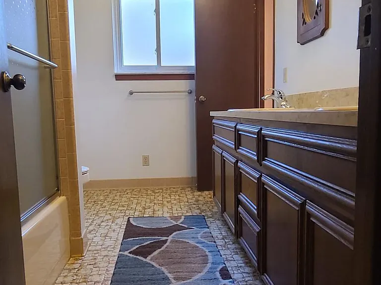 1 1/2 Bath. Bath tub and Shower.