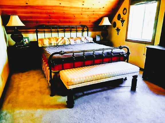 Guest House Bedroom with California King Bed, Office Area with Oak Rolltop Desk, Walk-In Closet with Storage & More...