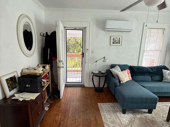 Entrance and living room with queen size sleeper sofa