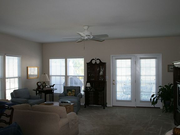 Large den with door to deck