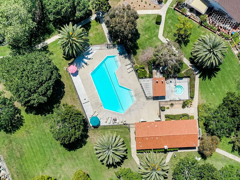 View 2 of the south pool and surrounding green space.