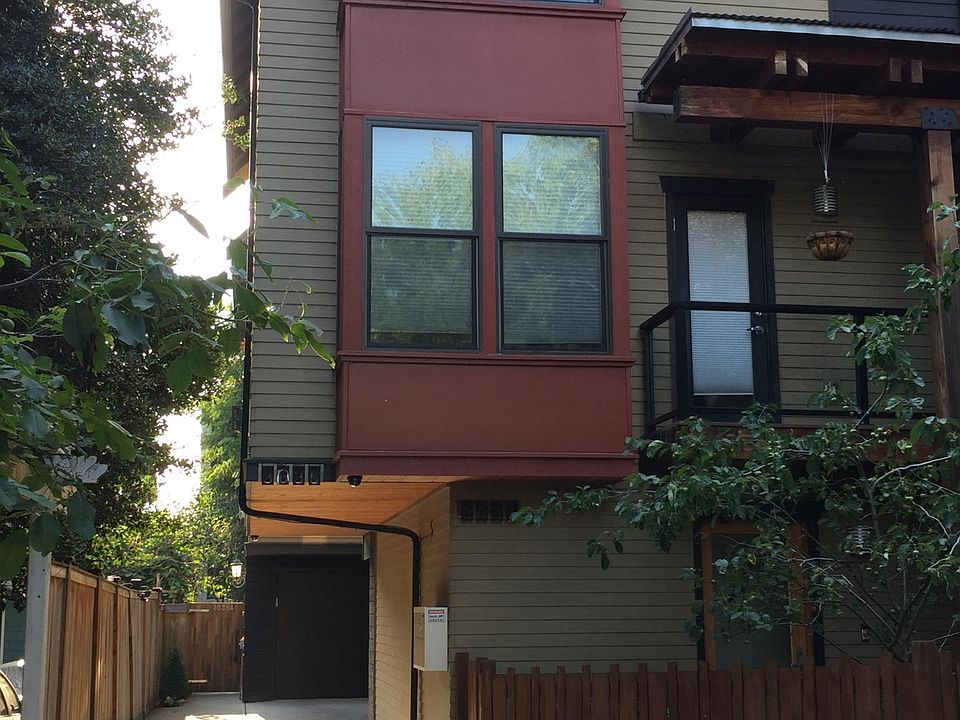 Fourplex townhouse, unit A in back, off street, garden oasis