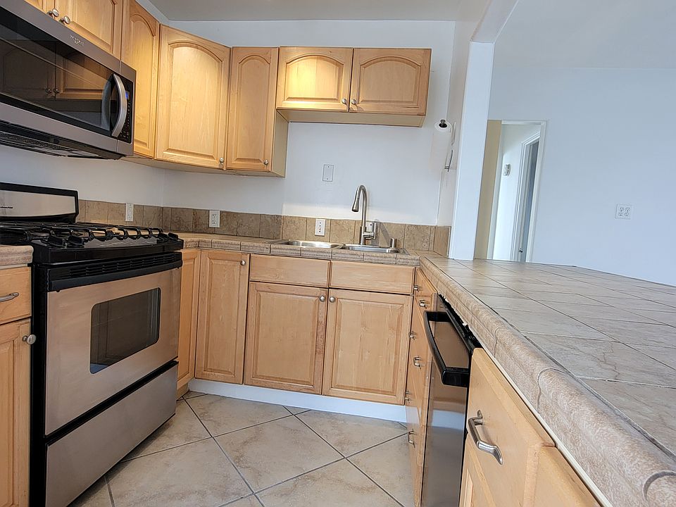 The kitchen has a lot of storage space.
Two large drawers next to the dishwasher and a lazy susan base unit in the corner.