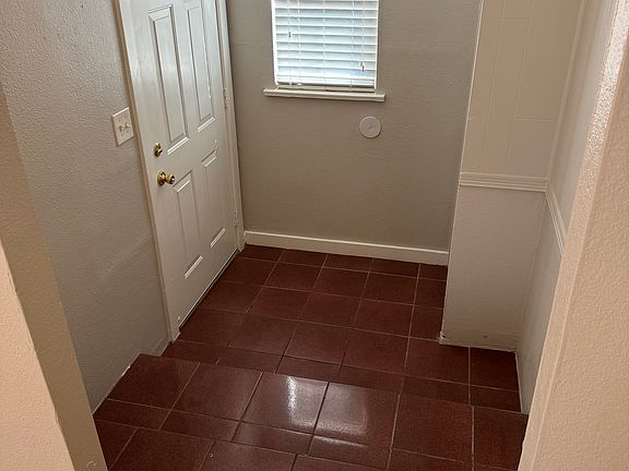 Foyer with small coat closet