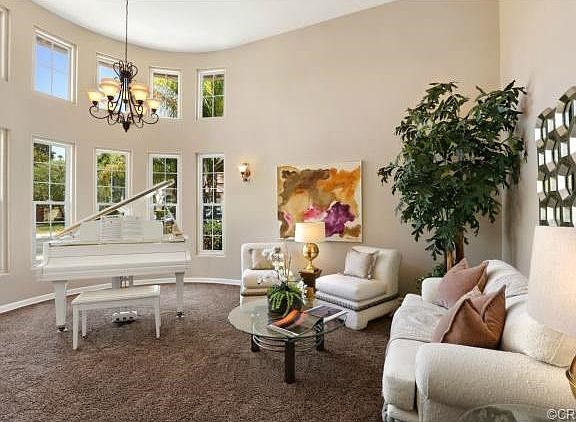 Elegant Living Room with 2 Story Ceiling and Great Natural Light