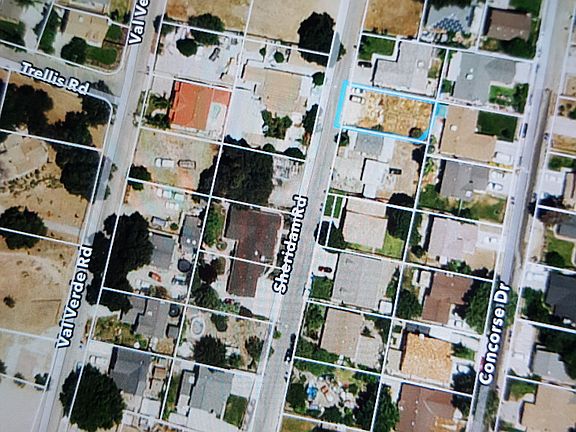 Lot highlighted in blue.