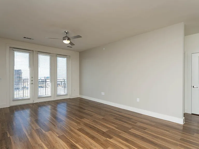 Living Room with Balcony and Hard Surface Flooring