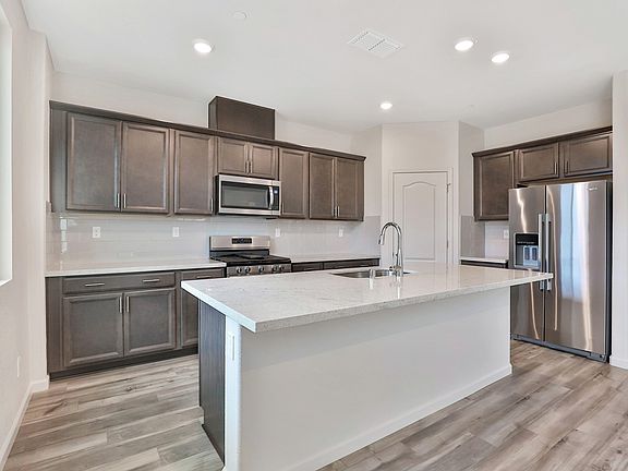 Residence 3 kitchen at a nearby Meritage community.