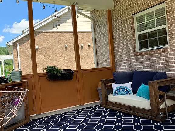 Back patio overlooking lush 