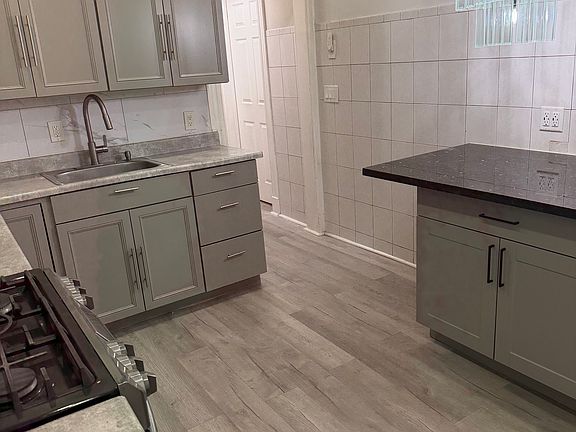 Elegant lighting and kitchen island, ideal for eating or cooking...